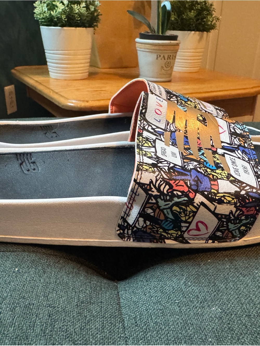 New Balance White Slip-On Sandals with Multicolor Graphic Strap